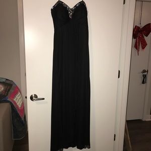 Black strapless dress with beaded design at bust